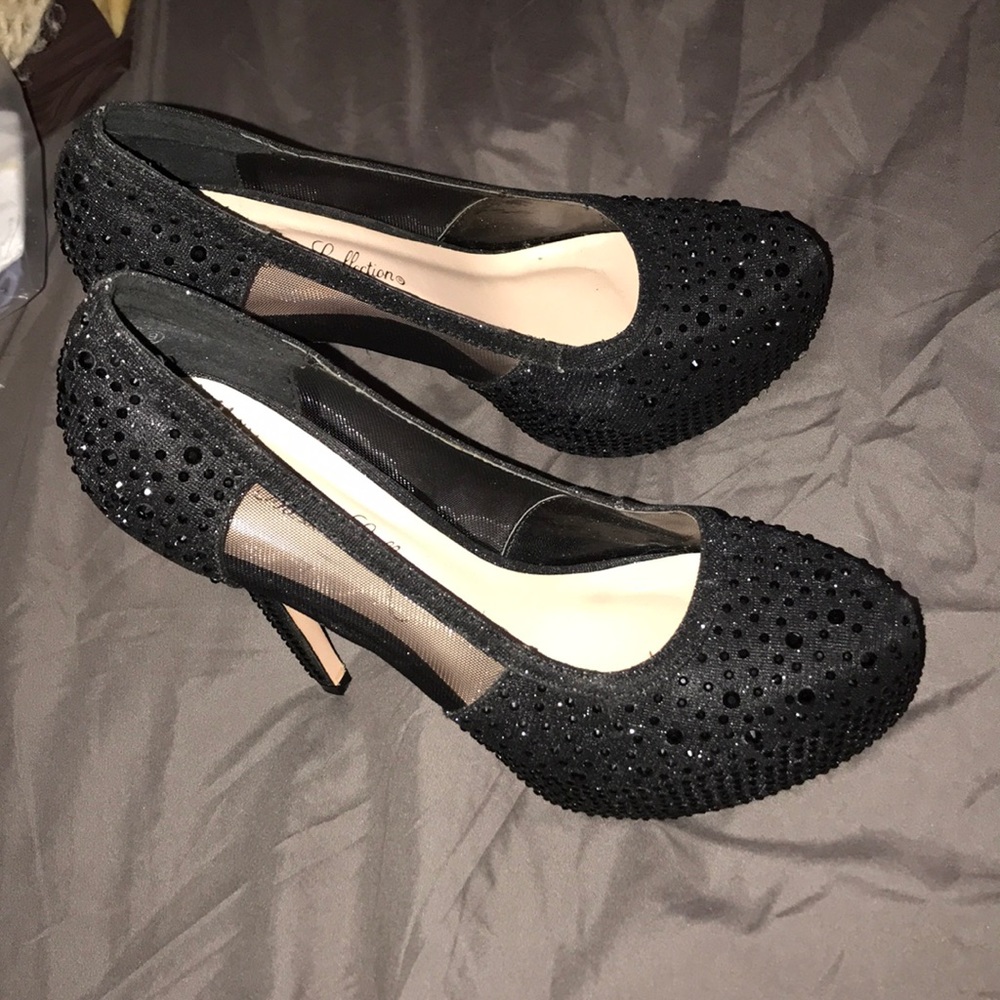 Platform high heels. Only worn once to my prom.